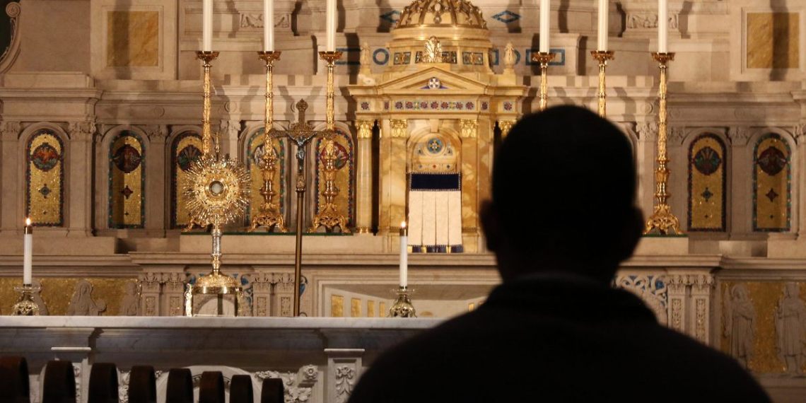 church praying eucharist
